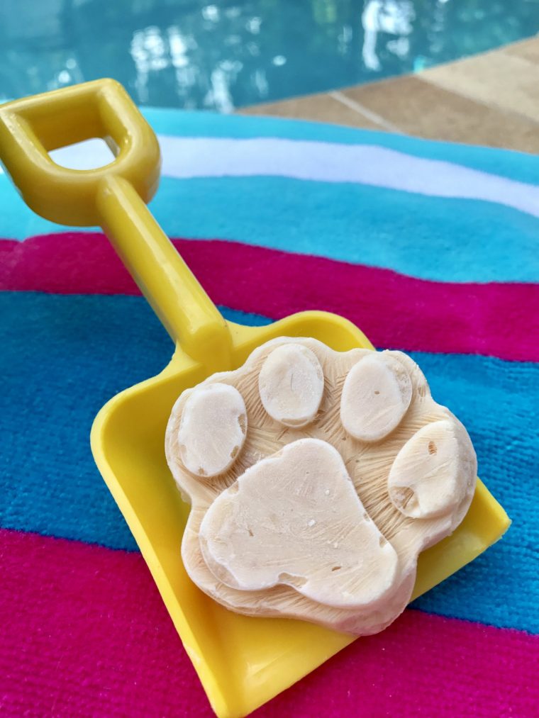 A Beat-the-Heat Ice Cream Treat photographed in a child's yellow beach shovel.