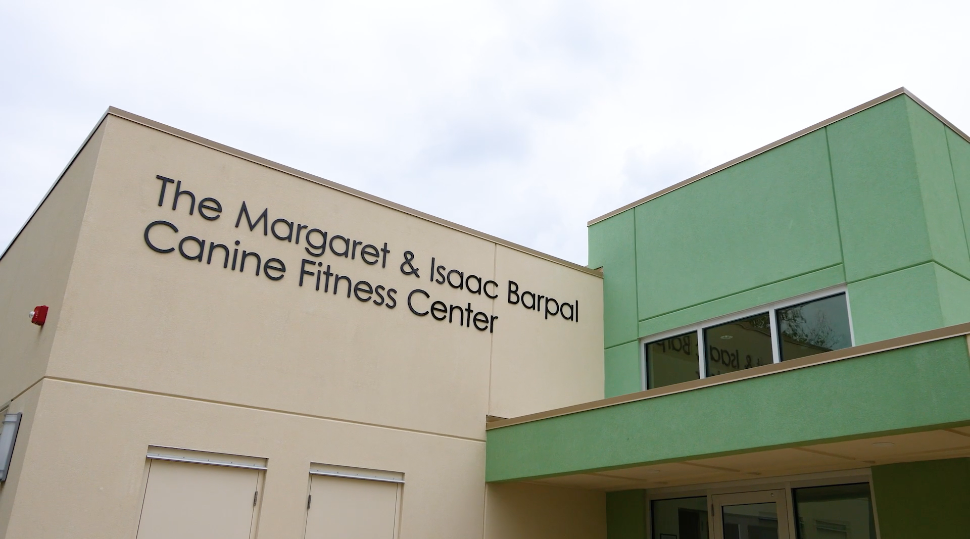 A screenshot from the grand opening of the Margaret and Isaac Barpal Canine Fitness Center on the campus of Southeastern Guide Dogs in Palmetto, Florida USA video.